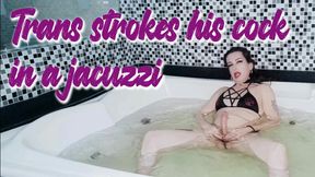 Trans strokes his cock while smoking in a jacuzzi