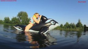 Alla has a hot ride on a squeaky old inflatable whale on the lake and wears a rare inflatable vest!!!
