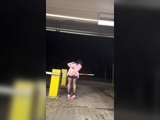 Sissy playing in public parking lot