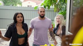 Tattooed blonde dude fucks two horny sluts in a van