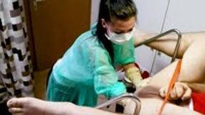 Young black haired nurse fists his ass