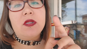 Smoking a cigarette