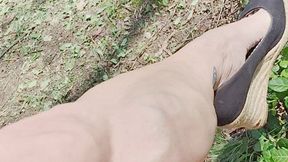 Tempest wearing wedges in the woods
