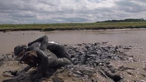 mud wrestling--who wins, women or man! (wam, wet and messy)