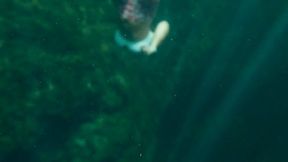 Carissa free diving in the deep spring; amazingly deep!