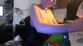 dutifully working away sewing face masks while plugged and corseted, with a tight hobble skirt on and my wrists chained toget...