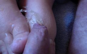 Closeup of John peeing on Jens feet