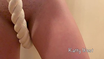 Skinny russian babe Katty West makes exercises on the wall-mounted ladder