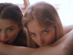 Naughty young babes involved in torrid lesbian threesome