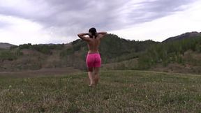 Pretty adult lady shows off her butt&#x1F351; while stripping in the forest