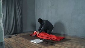 Bondage with red tourist bag with vibro and straps in vacuum bag