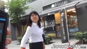 Japanese cutie's golden nuggets splashed widely, dripping down city street