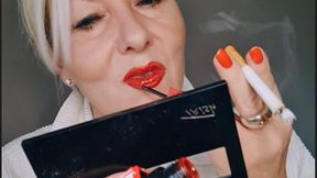 Stepmummy makes up her lips with glossy red lipstick while smoking a cork*OMI's*French Inhale*Close up sequences*cheek cavities pull