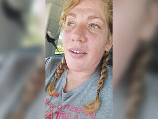 redhead with large breasts JOI / tease in car during the time that driving to the gym