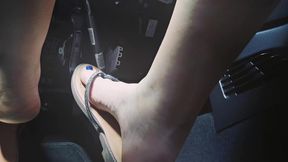 driving in flip-flops and pedaling blue nail polish