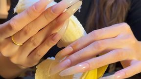 #250 - Banana handjob with very long natural nails