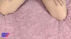 Girl with big tits rubs pussy and cums