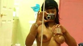 Black curvy and horny amateur chick tapes herself naked in the mirror