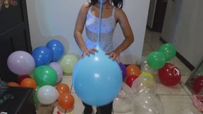 Clown Akina blowing up balloons