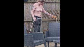 Mommy tends to her garden bare-breasted, then swaps with son for a nude soak in the hot tub