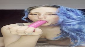 sucking on this pink dildo like it s something else...