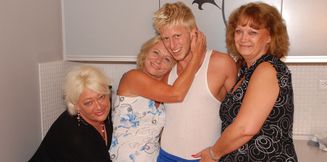 One Toyboy having sex with three mature ladies