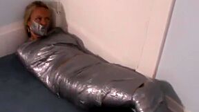 Blonde Girl Wrapped Up Mummification
