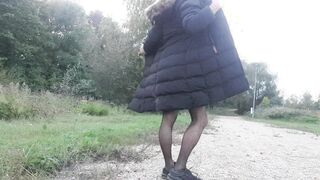 Femboy unclothes, poses nude in public place. Showcases rectal fuck hole...