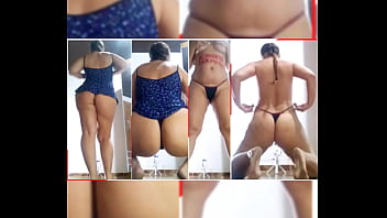 Striptease amador, camisola azul e calcinha preta