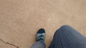 Fifi pedal pumping in Teva hiking sandals with socks and blue jeans