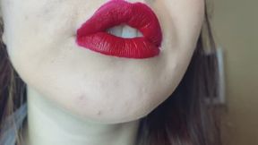 Rebecca Noir put-on-red-lipstick-close-up-view
