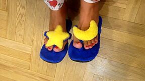 Girlie Fuzzy Moon Flip Flops And Red Toenails