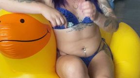 girl on inflatable blowtopop balloons