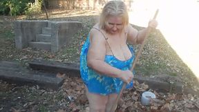 This exhibitionistic granny knows the best way to remove leaves in her yard
