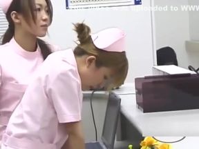 Asian Nurse Pounded in Both Ends by Toy-Wielding Lesbos
