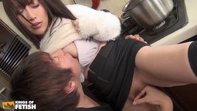 japanese with big tits squirts while lover fucks her with a big cucumber in the kitchen