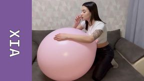 HUGE BALLOONS and a sharp needle