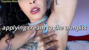 Applying Cream to Your Armpits with Mischief and a Natural Scent