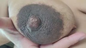 Closeups of my pregnant titties and DARK areolas