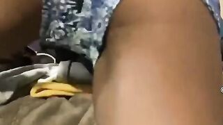 shaking booty over bed inside butt shorts