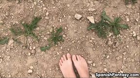 Walking barefoot through the grass-dirt