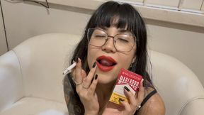 Smoking a red Marlboro in red lipstick