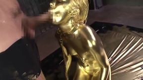 Gilded curves: Painted in gold, she's a work of art.
