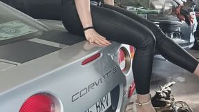 Touching and Lying on a Corvette Car with white high heels