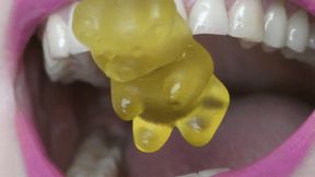 Let gummy bears feel the sharp efges of your wonderful sharp pointiy teeth MP4 HD 720p