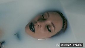 Tattooed BDSM Babe in Latex and Milk Bath