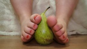 Playing with the toes of the bbw with a pear