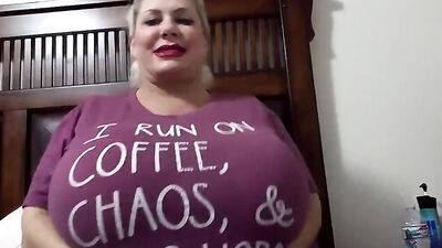 Naughty blonde mom Claudia Marie is squeezing her massive juggs