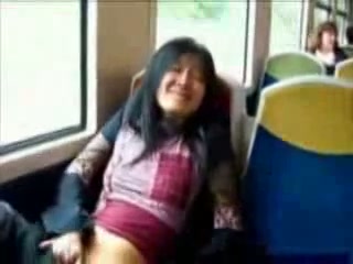 My uninhibited brunette chick plays with her cunt on public