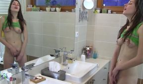 This slim sweetheart loves masturbating in front of the mirror every morning
